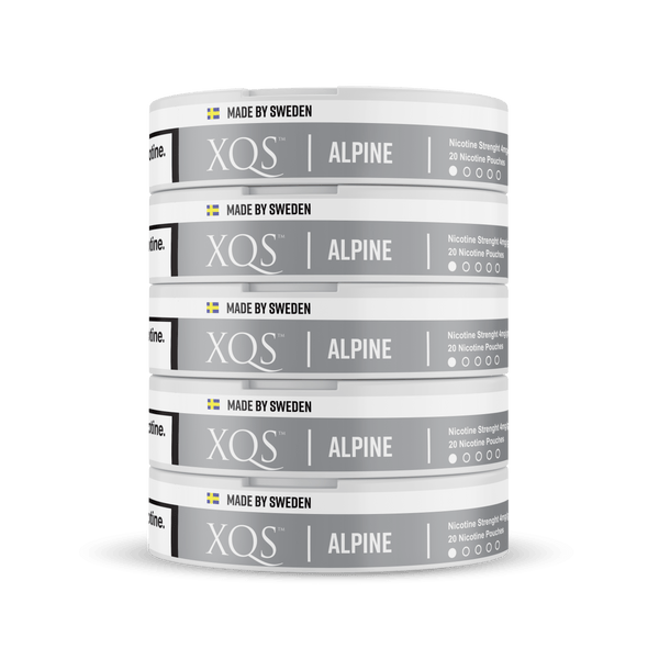 Alpine Nicotine Pouches by XQS, showing a close-up of the sleek, white nicotine pouch containers with branding.