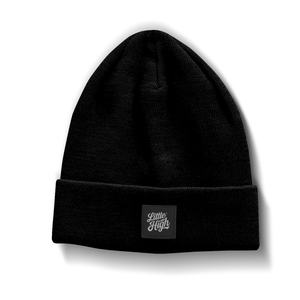 Little High Essential Beanie worn by a person, showcasing soft knit fabric and stylish fit, perfect for casual winter wear.