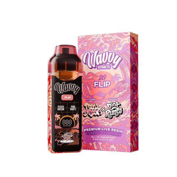 A Wavy Extracts 24 Flip disposable vape device with amber liquid, shown next to its pink and purple packaging box on a solid green background.