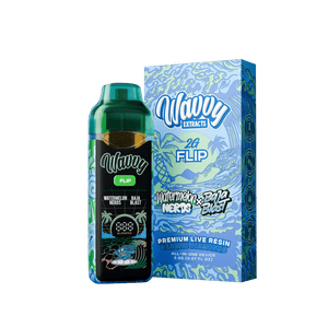 A bottle of Wavy Extracts 2G Flip live resin next to its retail box, featuring a tropical blue and white wave design, set against a solid dark green background.