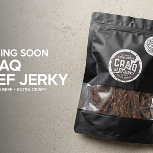 Close-up of Craq Extra Crispy Beef Jerky pieces, showcasing their crispy texture and rich, savory appearance.